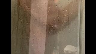 Alluring Curvy MILF Orgasms in Steamy Hotel Shower