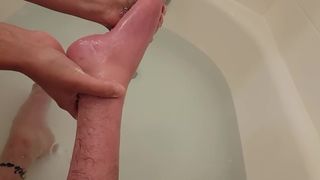 Paraplegic Having Tiny Feet and Scrawny Legs Washed In A Bathtub - First Person View