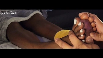 African freckled soles stroked and cleaned