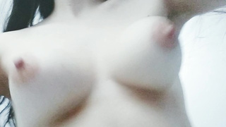 Bouncing my pale natural titties from a funny angle.