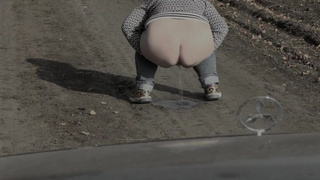 Pissing on the road cougar big beautiful woman milf.