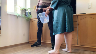 Dear mother-in-law takes off her panties and pees with her legs fat open in a bucket next to her son-in-law