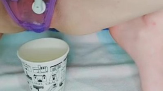 Alluring cunt pissing in panties and masturbates with a toothbrush