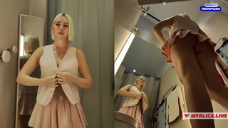 Changing in a public locker room. Transparent clothes on monstrous breasts