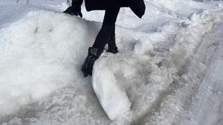 The whore is trying to walk on ice in ballet boots, but her toes are very painful