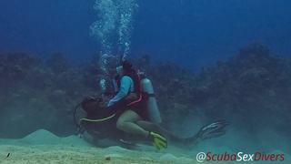 SCUBA Sex in a Miniskirt by a Pretty Coral Reef