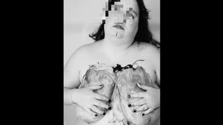 BIG BREASTED WOMAN covers saggy boobies in Chocolate
