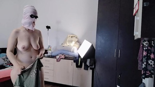 Homemade wifey has fun trying on clothes and cutting them. Home-made ex-wife dances naked around the house.